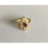 An 18 carat gold ruby and diamond Art Deco style c