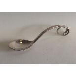 GEORG JENSEN: A stylish silver preserve spoon of t