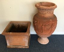 A Continental terracotta planter together with one