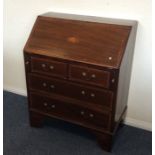 A Victorian bureau with shell decoration. Est. £30