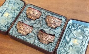 A good quality cased set of four filigree silver s