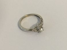 A diamond single stone ring in white gold claw mou