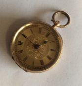 A lady's 14 carat cased fob watch with loop top. A