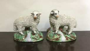 A pair of Staffordshire sheep. Est. £30 - £50.