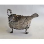 An 18th Century Irish silver sauce boat attractive