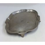 A Georgian silver teapot stand of shaped form. Lon