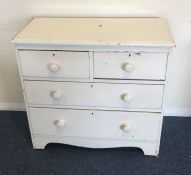 A small painted pine chest of four drawers. Est. £