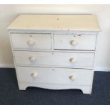 A small painted pine chest of four drawers. Est. £