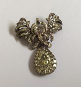 An attractive Georgian silver mounted brooch with