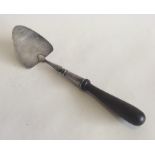 An unusual Antique silver pastry trowel on turned