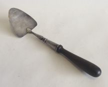 An unusual Antique silver pastry trowel on turned