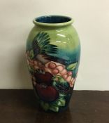 MOORCROFT: A stylish baluster shaped vase decorate