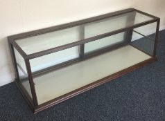 A good mahogany glazed display cabinet. Est. £200