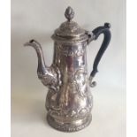 A good George II silver tapering coffee pot flambo