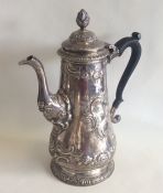 A good George II silver tapering coffee pot flambo