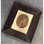 A framed mezzotint depicting a romantic couple. Es