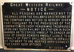 An old cast iron Great Western Railway warning not