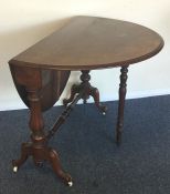 A Victorian walnut Sutherland table with fluted de