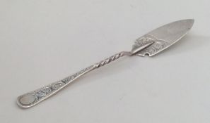 An Edwardian silver butter knife with engraved dec