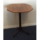 A Georgian mahogany veneered tripod table. Est. £3