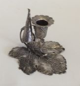 An unusual Victorian silver chamber stick and matc