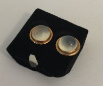 A pair of gold mounted circular ear studs. Approx.