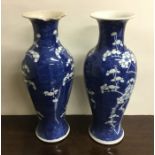 A tall pair of Chinese blue and white baluster sha
