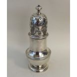 A good quality large Georgian silver caster with l