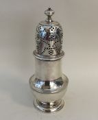 A good quality large Georgian silver caster with l