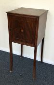 A Georgian mahogany pot cupboard with string inlay