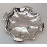 A stylish silver sweet dish of circular form. Lond