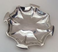 A stylish silver sweet dish of circular form. Lond