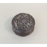 A good quality circular embossed ring box with hin