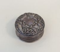 A good quality circular embossed ring box with hin