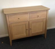 A 20th Century reproduction two drawer side unit.