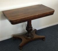 A Victorian rosewood hinged top card table. Est. £