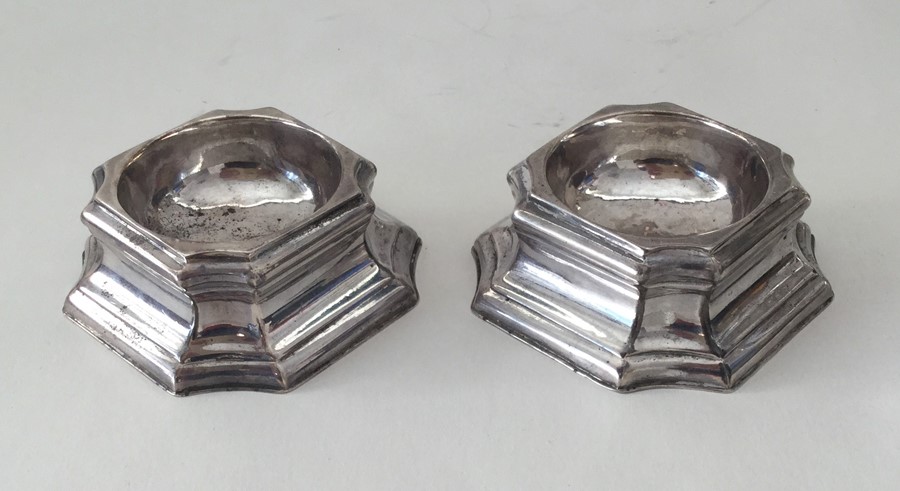 A pair of unusual George II silver trencher salts