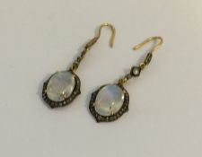 A pair of unusual rose diamond ear pendants with l