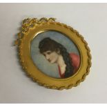 An attractive Antique oval miniature of a lady. Es