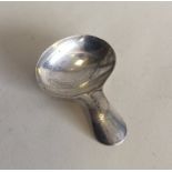 EXETER: A bright cut silver caddy spoon with oval