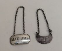 A Georgian silver wine label for 'Madeira' togethe