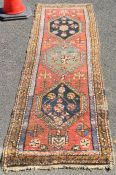 A small Oriental runner. Est. £25 - £35.