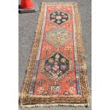 A small Oriental runner. Est. £25 - £35.