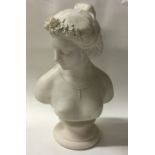 A Paragon bust of a lady's head on spreading circu
