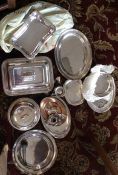 A box containing silver plated entrée dishes. Est.