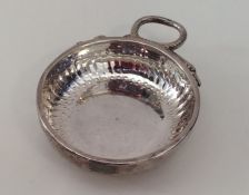 A heavy 18th Century French silver wine taster of