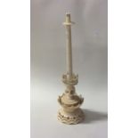 An unusual tapering carved ivory thermometer stand