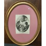 An oval gilt framed monochrome print of Giovanni D