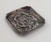 A Chinese silver bonbon dish with dragon decoratio