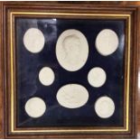 A framed and glazed set of eight intaglios. Est. £